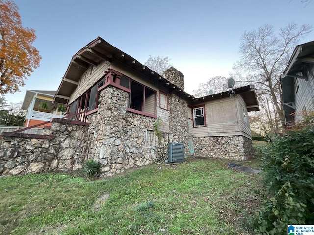 view of property exterior with cooling unit