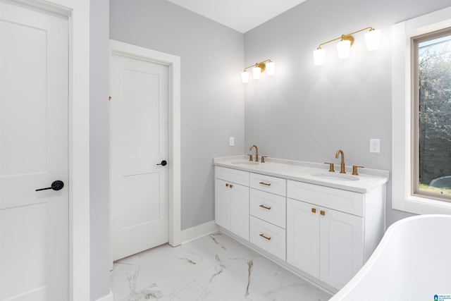 bathroom featuring a tub and vanity