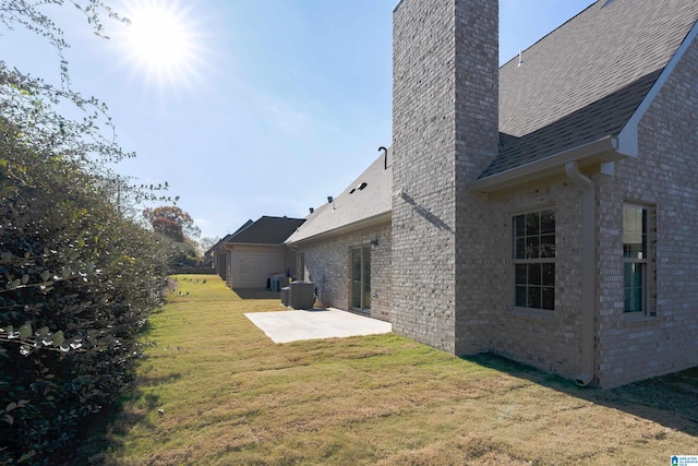 view of yard with a patio and cooling unit