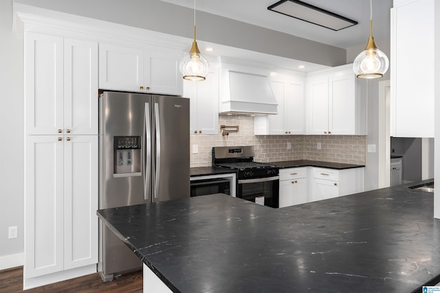 kitchen featuring hanging light fixtures, white cabinets, custom exhaust hood, and appliances with stainless steel finishes