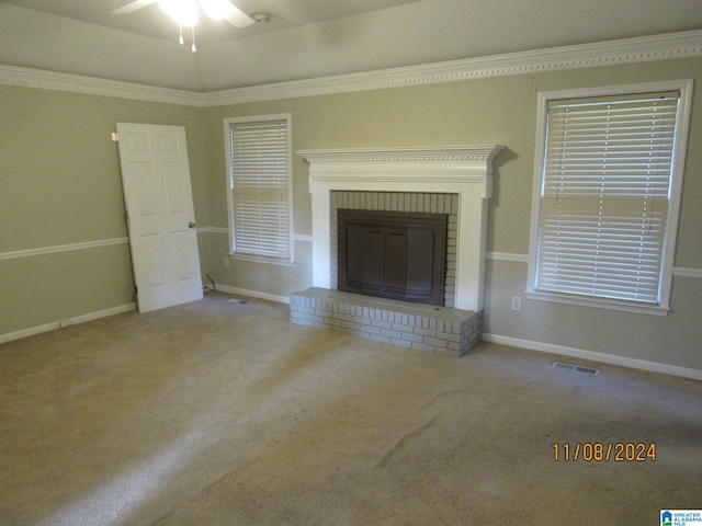 unfurnished living room featuring carpet, ceiling fan, and a fireplace