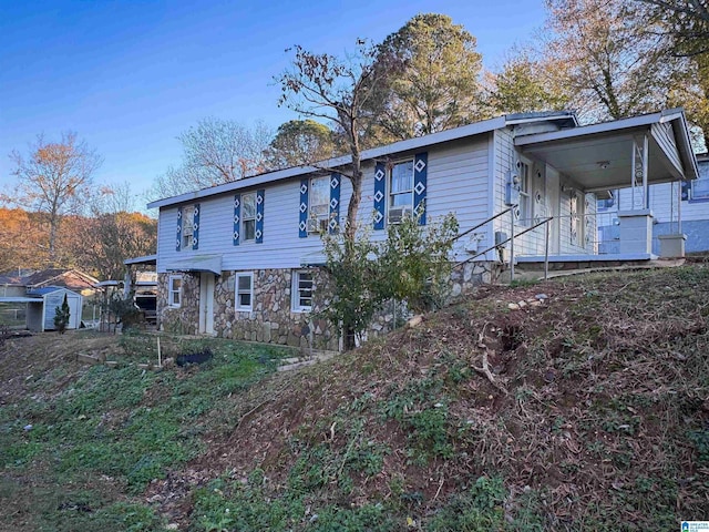 501 S Ledbetter St, Anniston, AL 36201 - rear view of property with a porch and stone siding