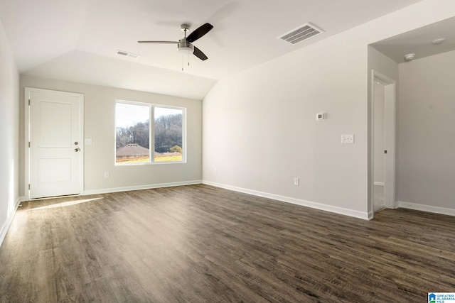 unfurnished room with ceiling fan, dark wood-type flooring, and vaulted ceiling