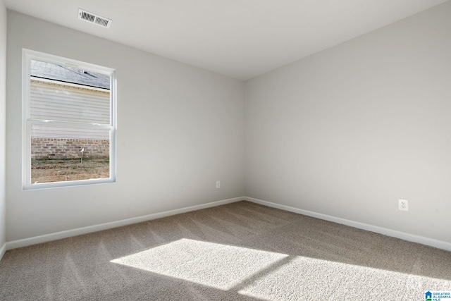 view of carpeted spare room