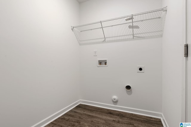 laundry area with hookup for a gas dryer, dark hardwood / wood-style flooring, washer hookup, and hookup for an electric dryer