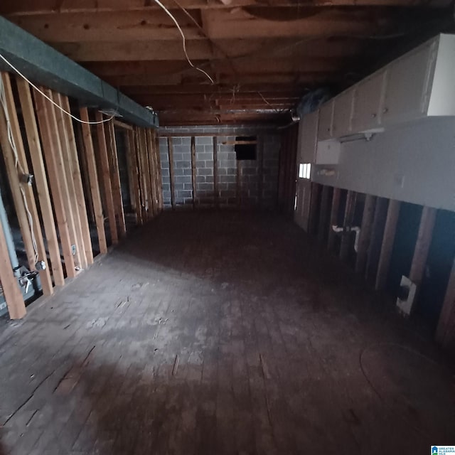 basement with wood-type flooring