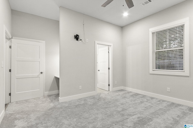 unfurnished bedroom with recessed lighting, baseboards, visible vents, and carpet flooring