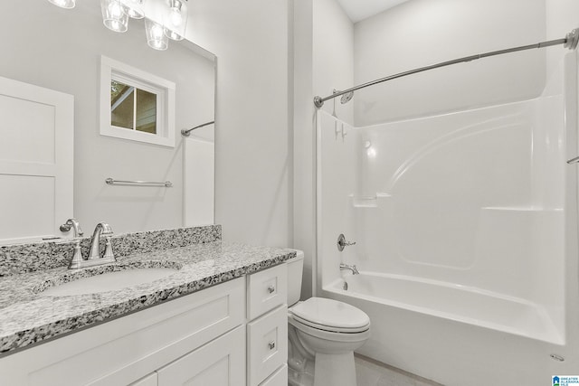 full bath featuring toilet, shower / bath combination, and vanity