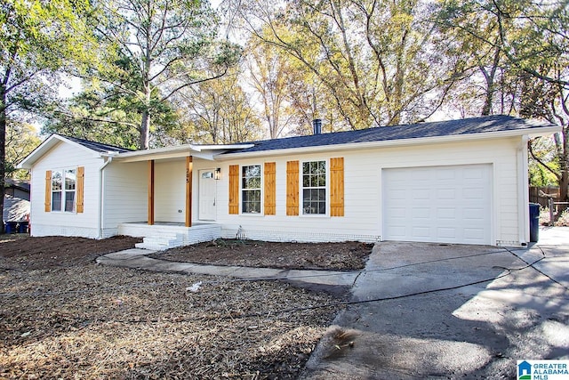 single story home featuring a garage