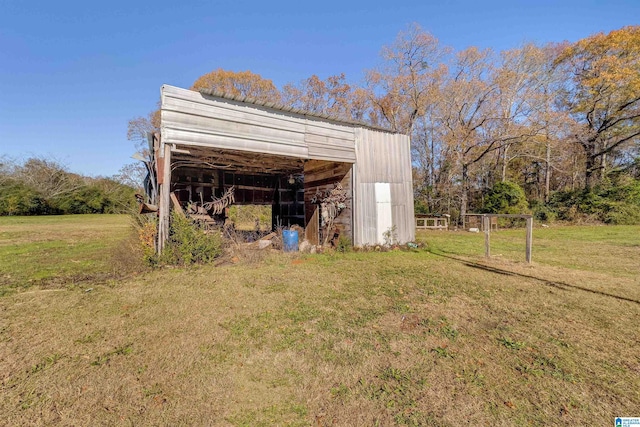 view of outdoor structure with a lawn