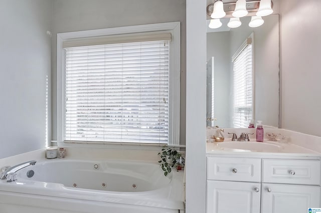 bathroom with a bathing tub and vanity