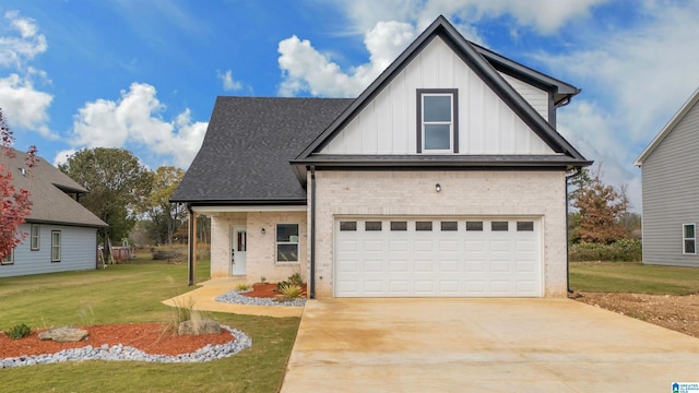 view of front of property with a garage and a front yard