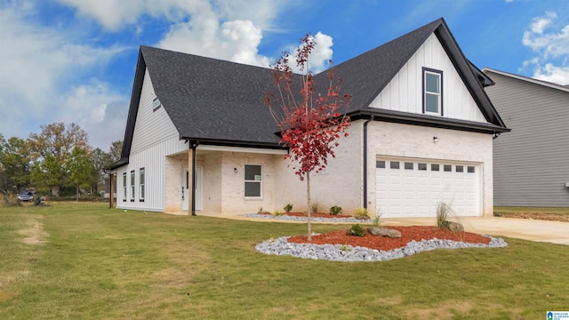 view of front of house with a front lawn and a garage