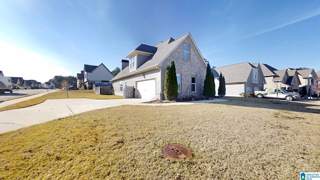 view of side of property with a garage