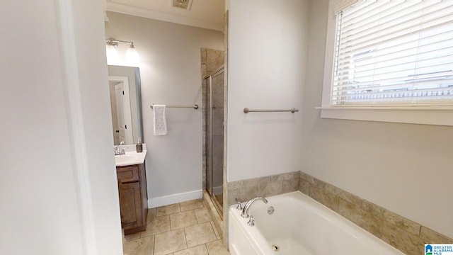 bathroom featuring tile patterned floors, separate shower and tub, and vanity