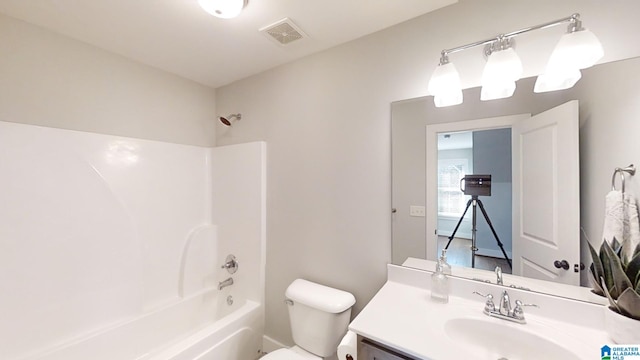 full bathroom featuring vanity, toilet, and shower / washtub combination