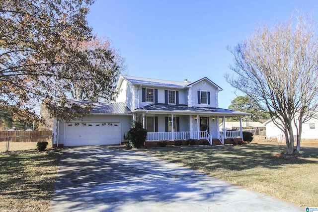 farmhouse-style home with a front lawn, a porch, and a garage