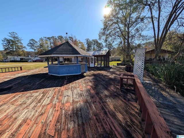 wooden terrace with a gazebo