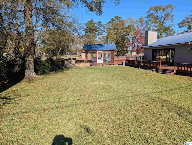 view of yard featuring a wooden deck