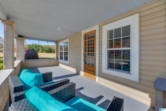 view of patio featuring a porch