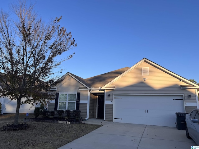 view of front of home with a garage