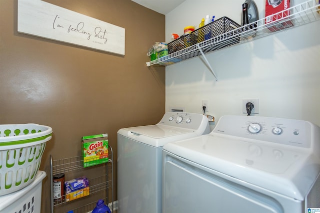 washroom with washer and clothes dryer