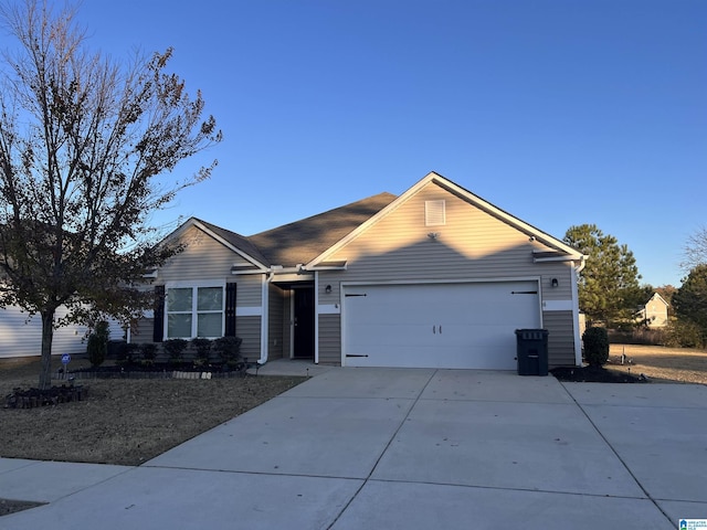 ranch-style home with a garage