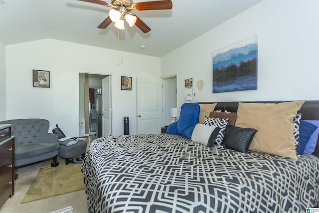 carpeted bedroom featuring ceiling fan and lofted ceiling