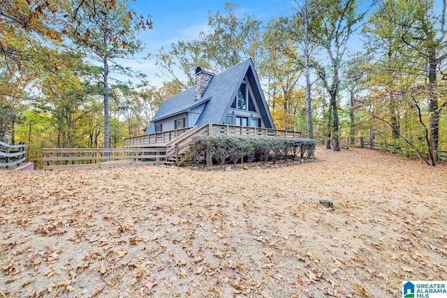 rear view of house with a deck