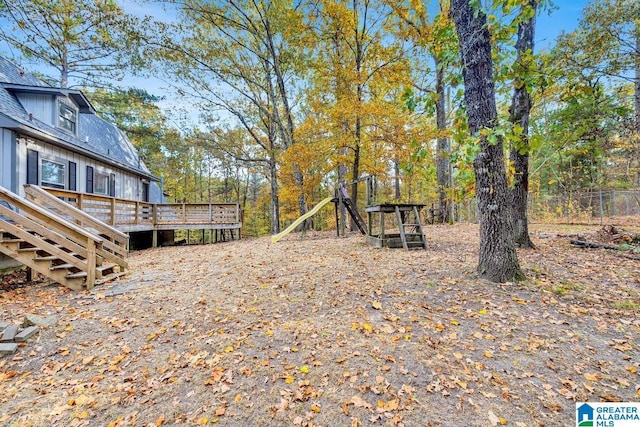 view of yard with a wooden deck