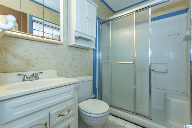 bathroom featuring walk in shower, tile patterned floors, vanity, and toilet