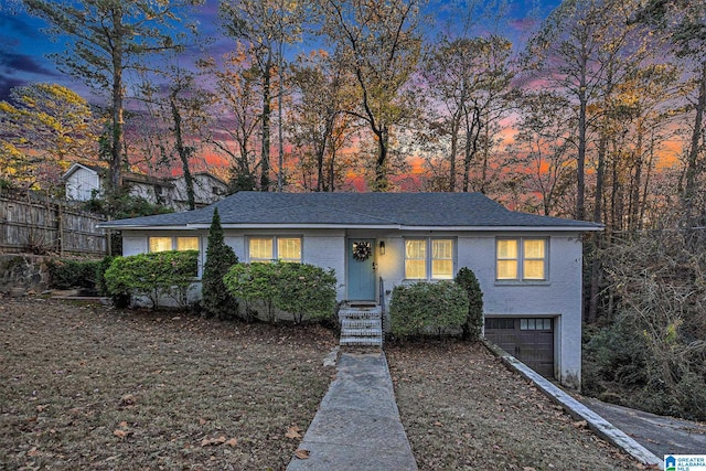 view of front of property featuring a garage