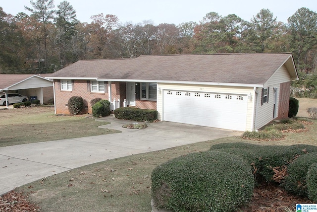 ranch-style home featuring a garage