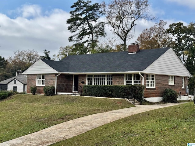 ranch-style home with a front yard