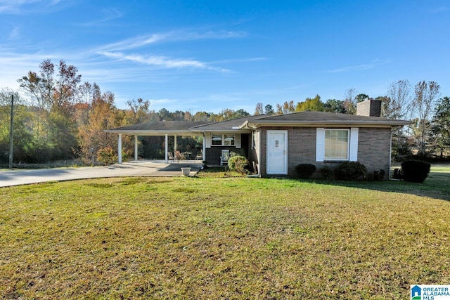 single story home featuring a front yard and a carport