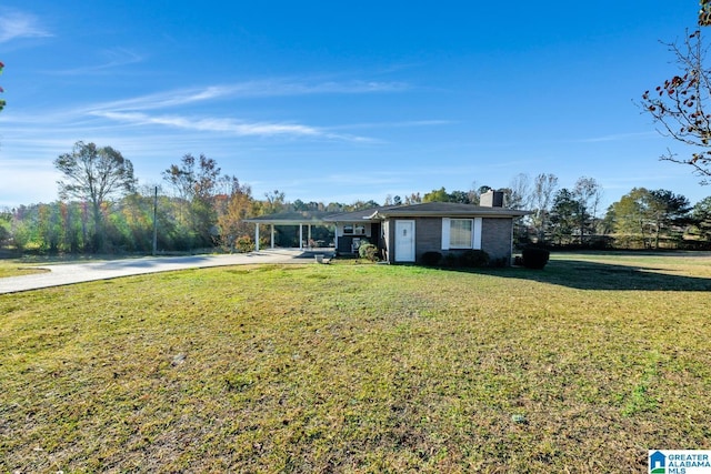 single story home with a carport and a front yard