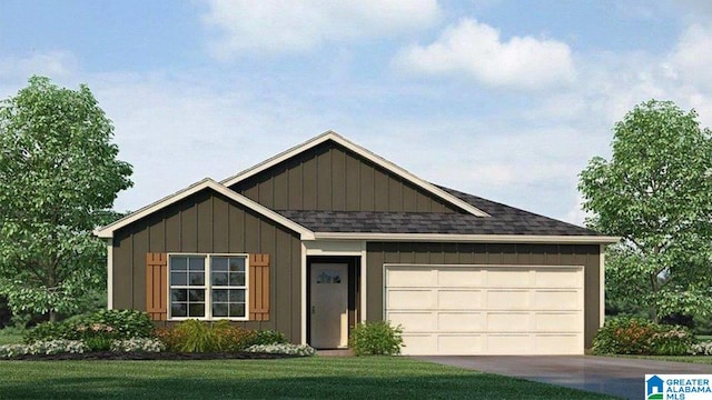 view of front of home with a front yard and a garage