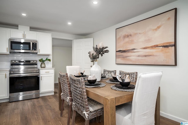 dining room featuring dark hardwood / wood-style floors