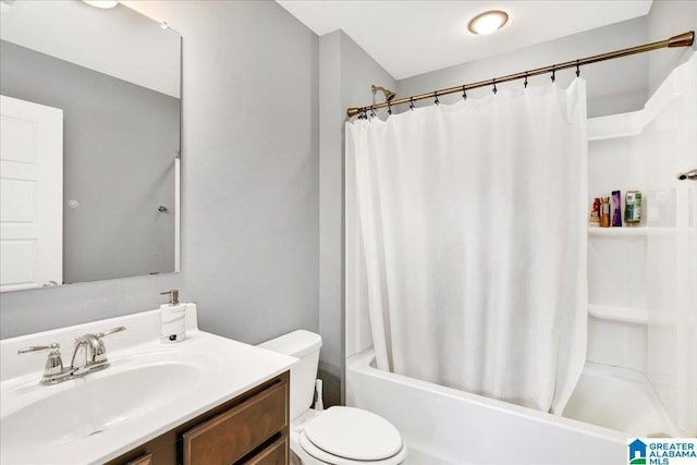 full bathroom featuring vanity, toilet, and shower / bathtub combination with curtain