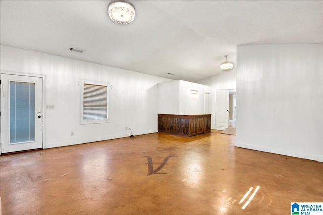 empty room featuring concrete flooring and a textured ceiling