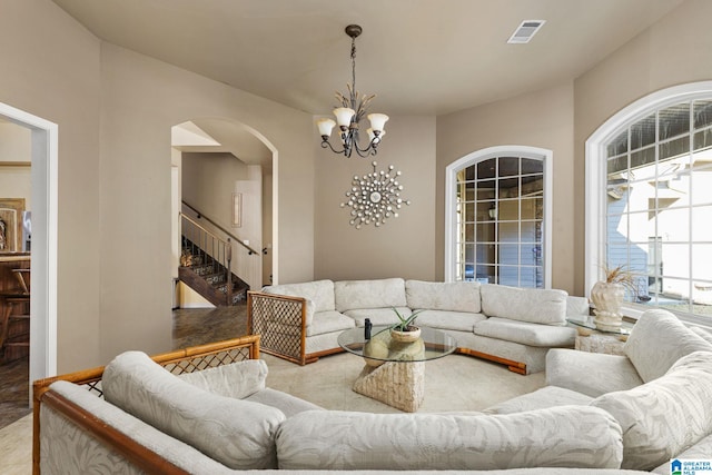 living room featuring a chandelier