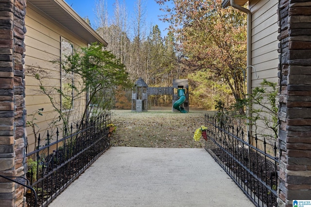 view of patio with a playground