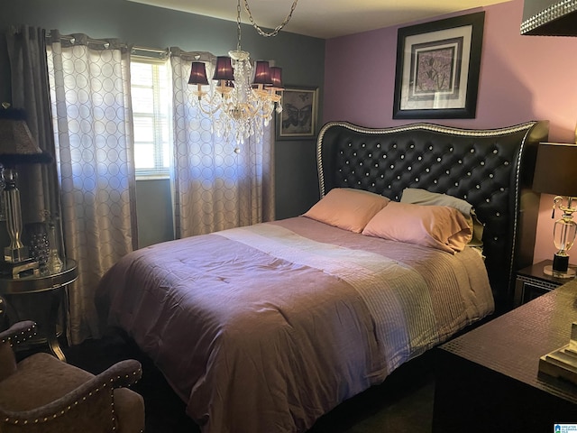 bedroom with a chandelier