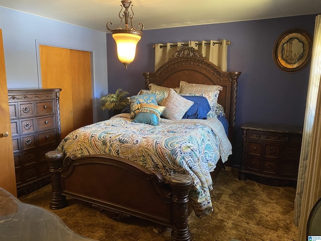 bedroom featuring dark colored carpet