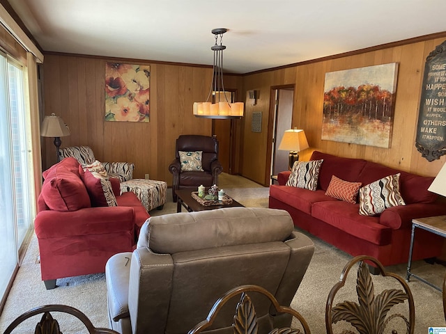 carpeted living room featuring ornamental molding and wooden walls