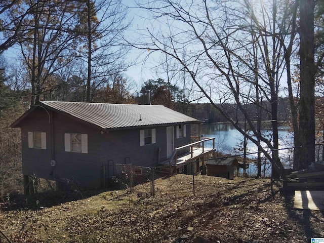 exterior space with a water view