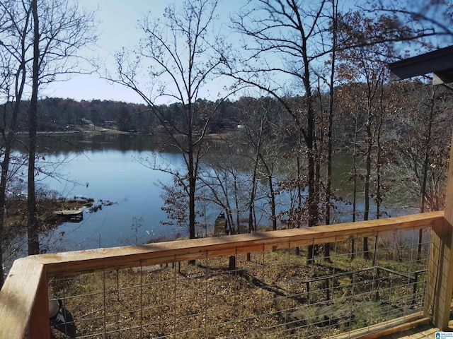 wooden terrace with a water view