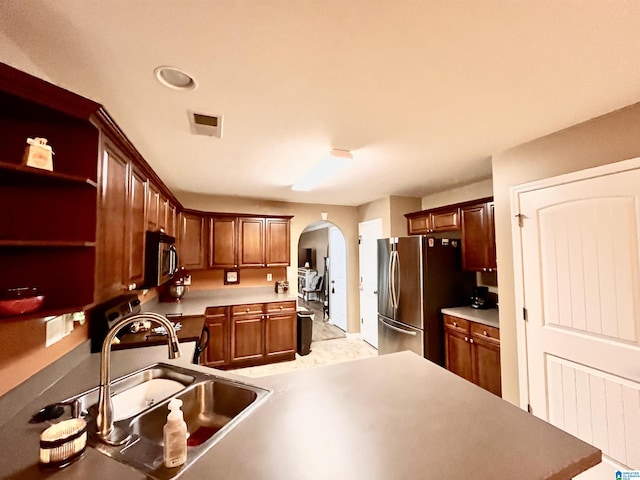 kitchen with sink and stainless steel appliances