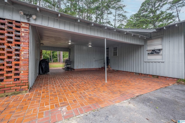 view of patio featuring a carport