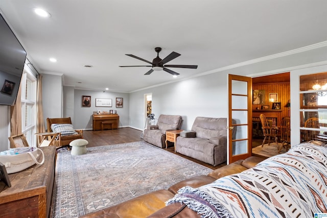 living room featuring french doors, hardwood / wood-style flooring, ceiling fan, and ornamental molding